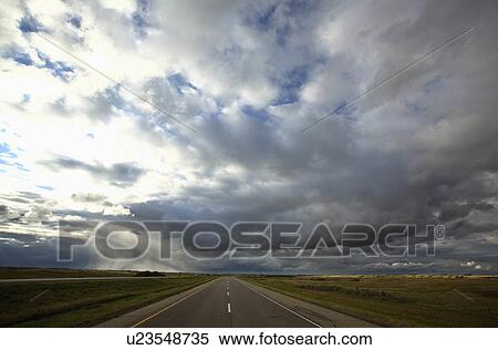 summer storm clouds in roadside highway country View Large Photo Image Stock Photography - summer storm clouds in roadside highway country. Fotosearch