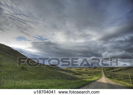 summer storm clouds in roadside sunlit shadows View Large Photo Image Stock Image - summer storm clouds in roadside sunlit shadows. Fotosearch