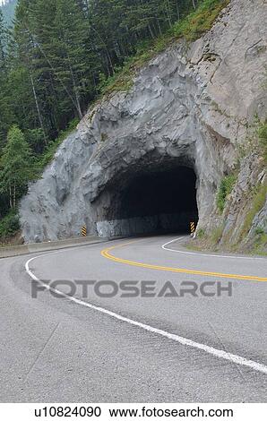 tunnel through mountain for highway travel View Large Photo Image Stock Image - tunnel through mountain for highway travel . Fotosearch