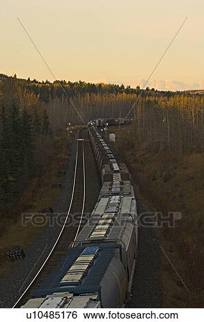 vertical image curving freight train cars rocky View Large Photo Image Stock Photograph - vertical image curving freight train cars rocky. Fotosearch