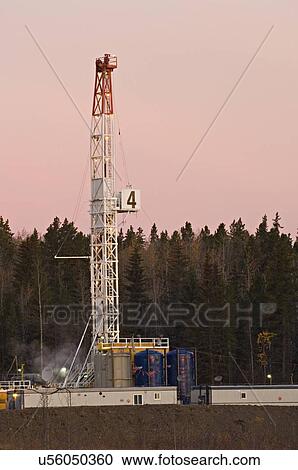 vertical image land based drill rig sunrise View Large Photo Image Stock Image - vertical image land based drill rig sunrise. Fotosearch