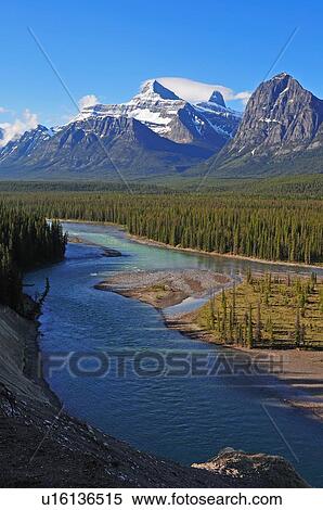Stock Photography -  vertical scenic image snowcapped canadian rocky. Fotosearch
