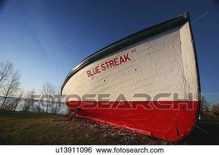 Stock Photograph -  water art beached fishing boat hecla lake fine. Fotosearch