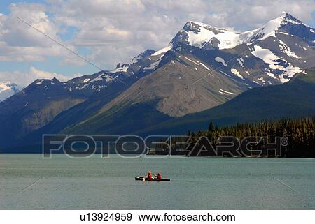 Stock Photo -  water nature tourist boating maligne lake rocky. Fotosearch