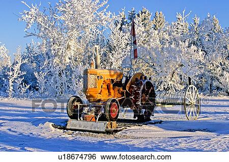 winter retired antique moline farm tractor day View Large Photo Image Stock Photograph - winter retired antique moline farm tractor day. Fotosearch