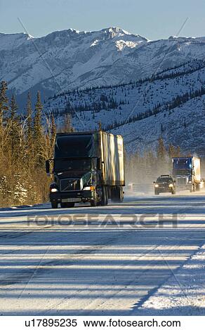 winter truck traffic highway through jasper park View Large Photo Image Stock Photography - winter truck traffic highway through jasper park. Fotosearch