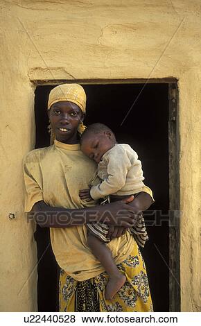 Stock Photo -  woman baby waarusha in homestead ngiresi village. Fotosearch