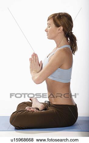 woman beautiful sexy young practices yoga mat View Large Photo Image Stock Photo - woman beautiful sexy young practices yoga mat. Fotosearch