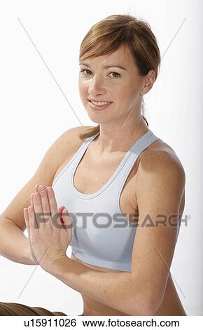 woman beautiful sexy young practices yoga mat View Large Photo Image Stock Photograph - woman beautiful sexy young practices yoga mat. Fotosearch