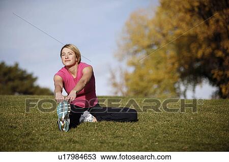 Stock Image -  woman fitness spring sexy athletic young yoga . Fotosearch