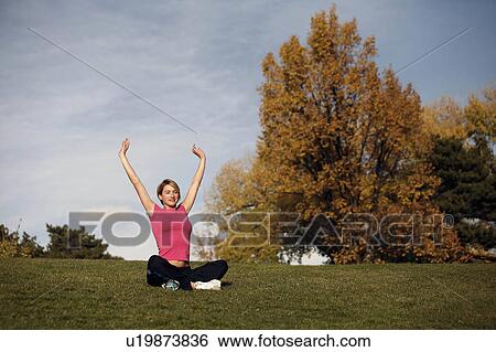 Stock Photograph -  woman fitness spring sexy athletic young yoga . Fotosearch