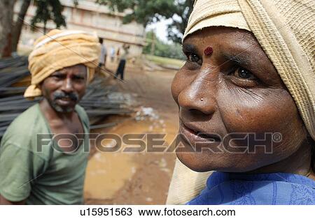 Stock Image -  woman man construction photos various locations. Fotosearch