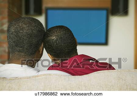 Stock Image -  woman people couple man person women seniors tv. Fotosearch