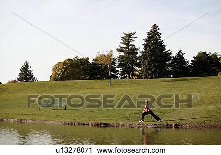 woman spring sexy athletic young stretches yoga View Large Photo Image Stock Image - woman spring sexy athletic young stretches yoga. Fotosearch