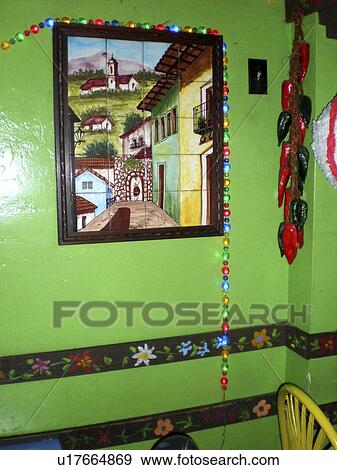 Stock Photo -  art green wall mexican restaurant in vertical. Fotosearch