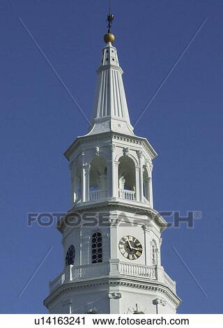 Stock Image -  background st michaels church steeple in sc. Fotosearch