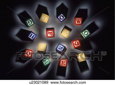 Stock Photo -  background toy blocks letters alphabet black. Fotosearch