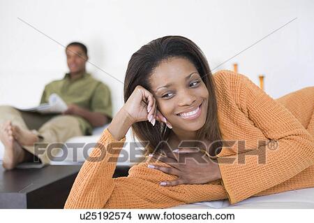 background woman people couple man home sofa View Large Photo Image Picture - background woman people couple man home sofa . Fotosearch