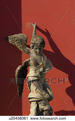 beautiful statue colorful wall in santorini View Large Photo Image Stock Image - beautiful statue colorful wall in santorini. Fotosearch