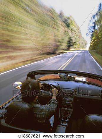 car people man person driving sports down road View Large Photo Image Stock Image - car people man person driving sports down road. Fotosearch