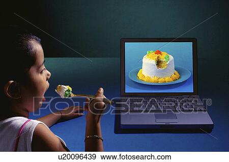 computer food people girl child person kid laptop View Large Photo Image Stock Photo - computer food people girl child person kid laptop. Fotosearch