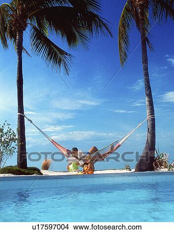 Picture -  family beach people child man kid father son boy. Fotosearch