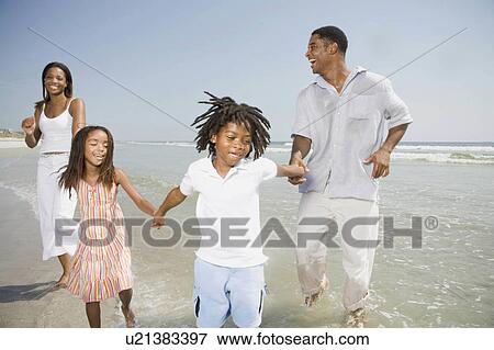 family beach people children father mother 30s View Large Photo Image Stock Photo - family beach people children father mother 30s. Fotosearch