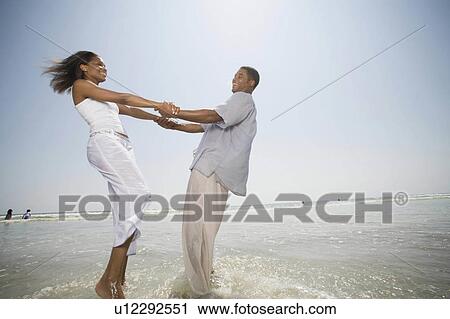 family beach people couple african american 20-25 View Large Photo Image Stock Image - family beach people couple african american 20-25. Fotosearch