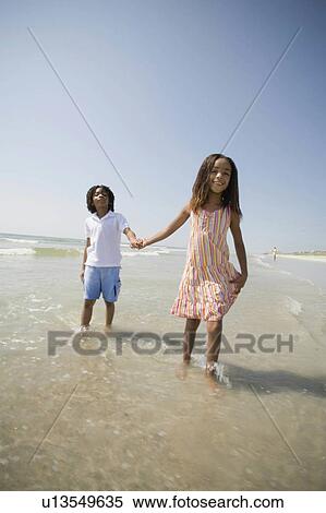 family beach people hand girl children brother View Large Photo Image Stock Photography -  family beach people hand girl children brother. Fotosearch