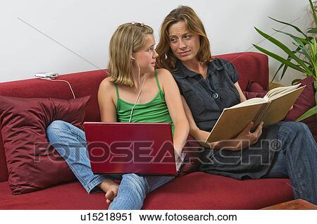 family computer child book laptop mutter liest View Large Photo Image Stock Image - family computer child book laptop mutter liest. Fotosearch