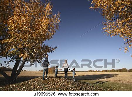 family people girl outside autumn boys View Large Photo Image Stock Photograph - family people girl outside autumn boys. Fotosearch