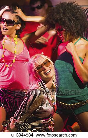 fashion dance young friends partying in night View Large Photo Image Picture - fashion dance young friends partying in night. Fotosearch