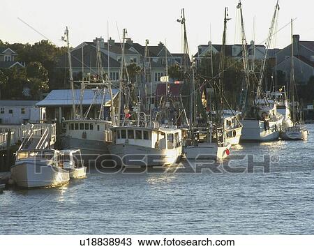 Stock Image -  fishing boats in charleston sc america day dock. Fotosearch