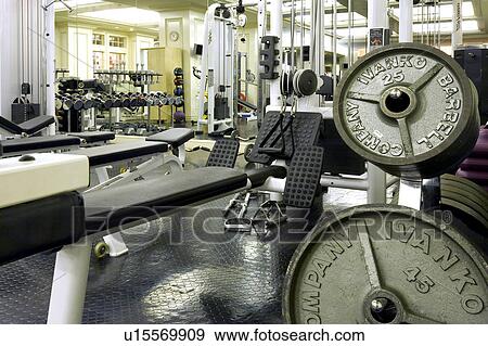 Stock Photo -  fitness center equipment private indoor sports. Fotosearch