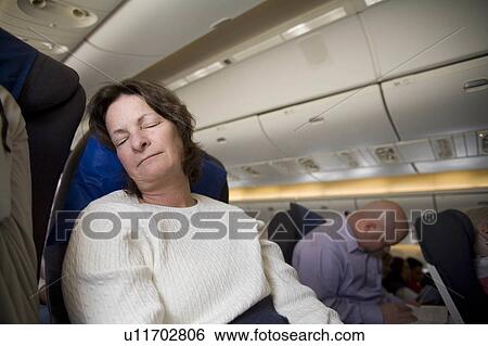 food airline traveler passenger passengers relax View Large Photo Image Stock Photograph - food airline traveler passenger passengers relax. Fotosearch