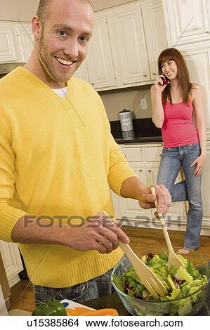 food people couple in kitchen making salad 20-25 View Large Photo Image Picture - food people couple in kitchen making salad 20-25. Fotosearch