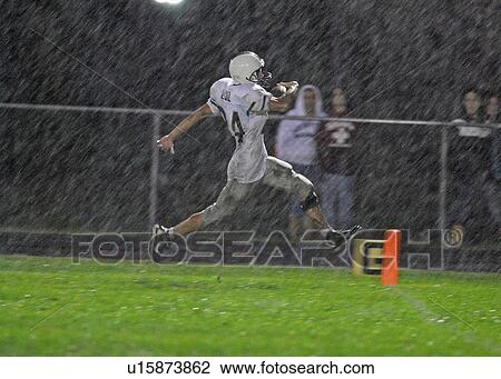 Stock Image -  football school new bedford bishop high. Fotosearch