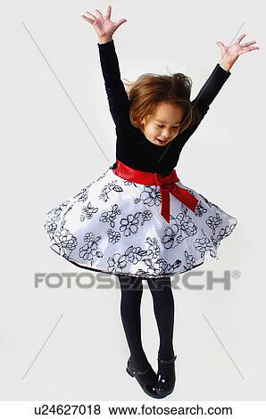Stock Photo -  girl child kid young dancing 5-6 years active. Fotosearch