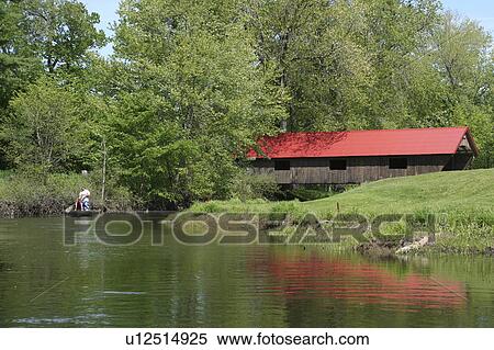 Stock Photography -  golf mike stone tyler floating ashuelot river . Fotosearch