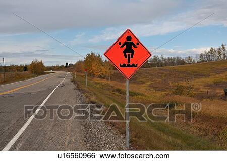 Stock Photograph -  horizontal image traffic warning sign bumps road. Fotosearch