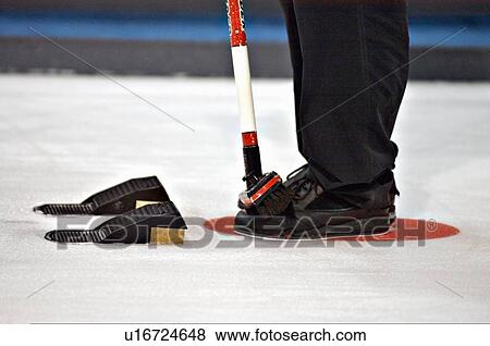 house sport curling competor stands behind hack View Large Photo Image Stock Photo - house sport curling competor stands behind hack. Fotosearch