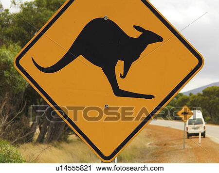 Stock Image -  kangaroo crossing funny symbolic orange highway. Fotosearch