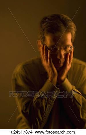 Picture -  man face middleaged wearing glasses hands model. Fotosearch