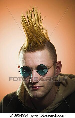 man face young mohawk hairdo wearing glasses View Large Photo Image Picture - man face young mohawk hairdo wearing glasses. Fotosearch