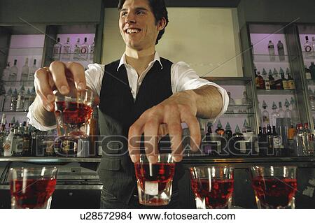 man person bartender bar 20s, 25-30 years alcohol View Large Photo Image Picture - man person bartender bar 20s, 25-30 years alcohol. Fotosearch