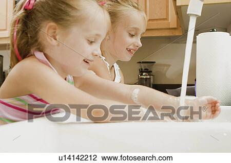 people children home girls washing dishes 5-6 View Large Photo Image Stock Image - people children home girls washing dishes 5-6. Fotosearch