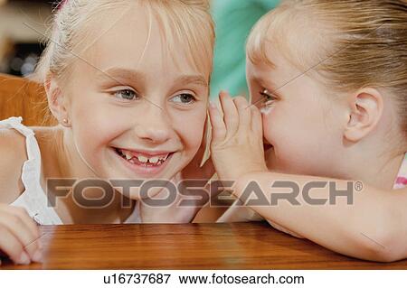 Stock Photo -  people children sharing secret 3-4 years 5-6 cute. Fotosearch