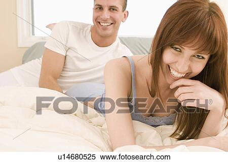 people couple happy in bed 20-25 years 20s 25-30 View Large Photo Image Stock Photography - people couple happy in bed 20-25 years 20s 25-30. Fotosearch