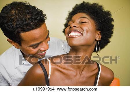 Picture -  people couple young enjoying company 20-25 years. Fotosearch