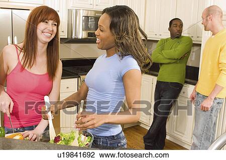 people friends get together in kitchen 20-25, 20s View Large Photo Image Stock Image - people friends get together in kitchen 20-25, 20s. Fotosearch